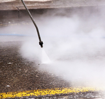 Drive-Thru Pressure Washing by Evergreen Law Care in Gainesville, FL