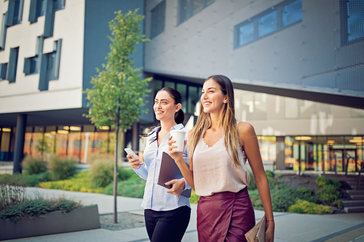 Employees Walking Outside Their Newly Landscaped Business